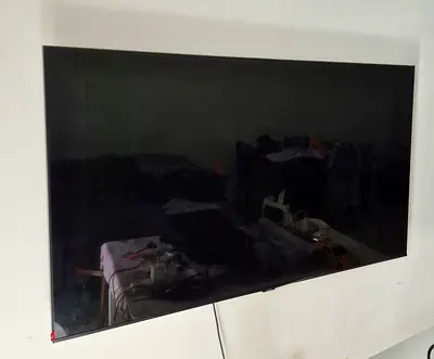55-inch LED Smart TV - Wall Mounted, Good Condition