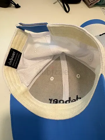 Blue and white running cap (new) deboer