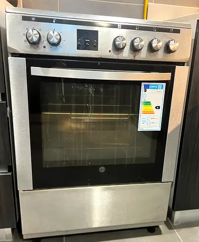 Used freestanding stainless steel gas cooker with oven (needs cleaning)