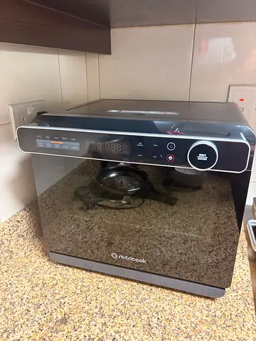 New mint condition steami X nutricook all in air fryer with 2 year warranty and bill