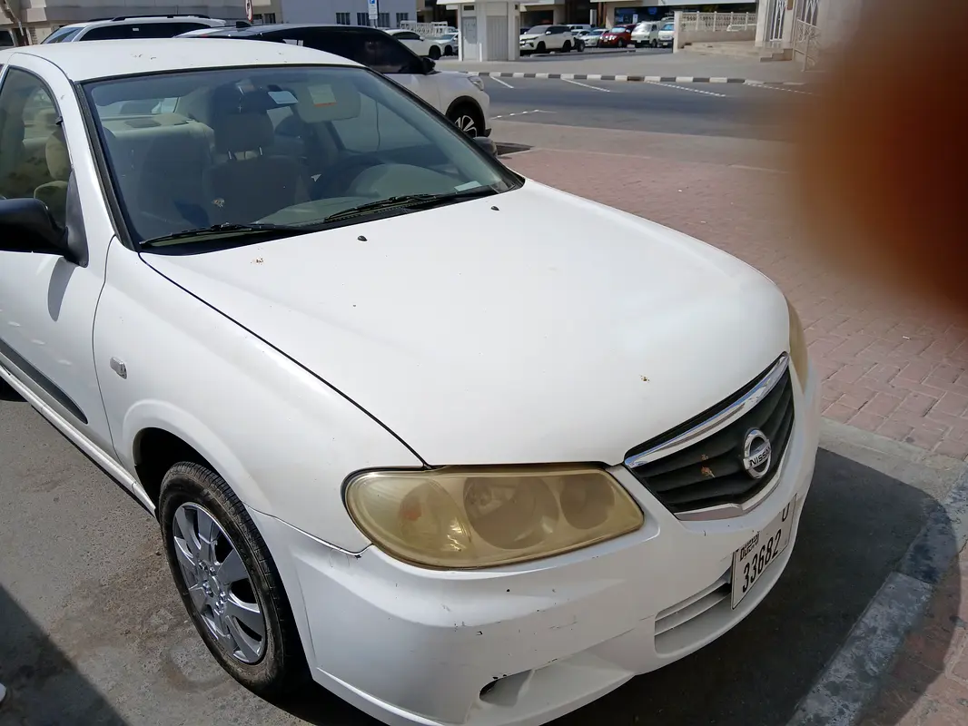 Nissan Sunny 2011 — photo 1 of 5