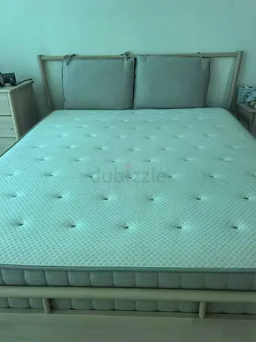 IKEA Queen-size bed frame with mattress and headboard - light wood