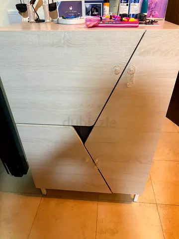 Compact light-wood cabinet with two doors — Brand new condition