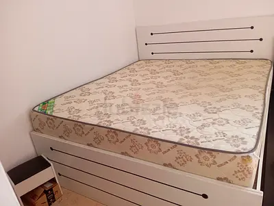 Bed with mattress