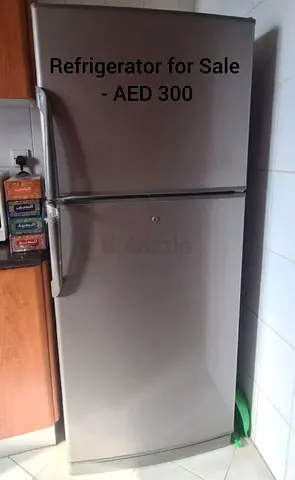 Used double-door fridge, good working condition - AED 300