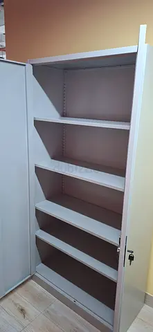White Metal Storage Cabinet with Multiple Shelves — Good Condition