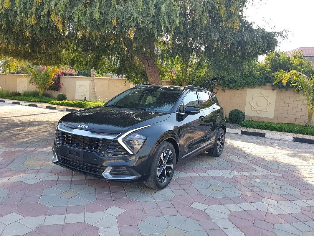Kia Sportage 2024 — photo 1 of 20