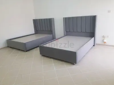 Pair of Grey Upholstered Single Beds with Headboards