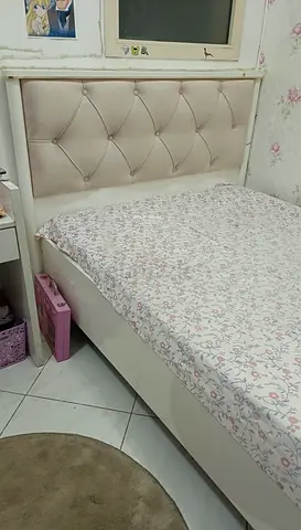 White Wooden Bed