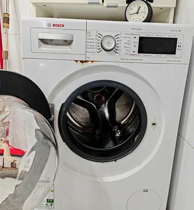 Bosch Front Load Washing Machine - Series 8, 8kg - Light rust on front - otherwise perfect running.
