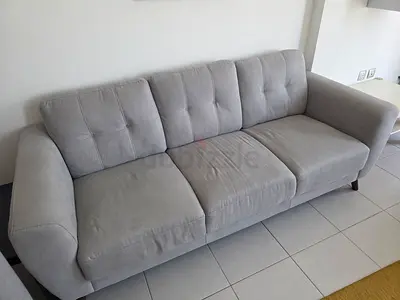 Light grey 3-seater fabric sofa - good condition 2 year old - needs a deep clean