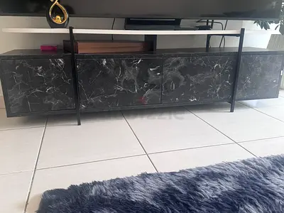Modern black marble-effect TV unit with metal frame