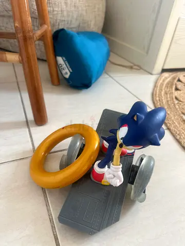 Sonic the Hedgehog figurine with gold ring and display base