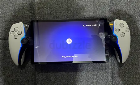 PlayStation Portal remote player with DualSense controllers - good condition