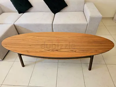 Mid-century oval wooden coffee table in good condition