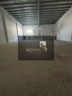 A prime warehouse for rent in Al Jurf Industrial Area 3, with an area of ​​5500 sq ft and 50 kW 