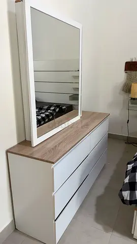 Dresser with drawer and sliding mirror with storage