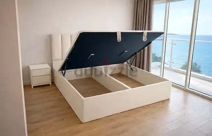 King-size Ottoman Storage Bed with Headboard - Cream Upholstery