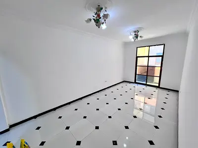 Al Rawda 3 Ajman - with a balcony offering excellent views - central air conditioning - card access - separate kitchen
