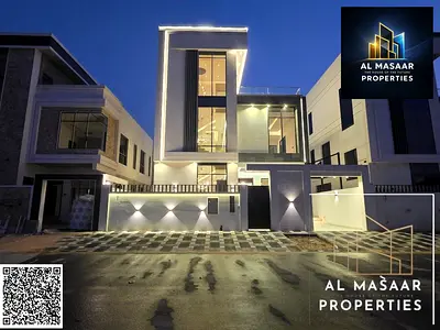 Modern three-story villa in Al Yasmin area, freehold ownership for all nationalities Strategic loca