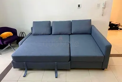 IKEA L-shaped Sofa Bed with Pull-out Section - Good Condition