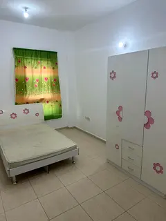 Very Clean Family room available for rent in Shabiya 11. Direct Owner. No commission or deposit.