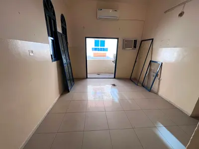 Two-bedroom apartment for annual rent – ​​Al Nuaimiya 2 – Ajman | Prime location near King Faisal Street | AED 28,000