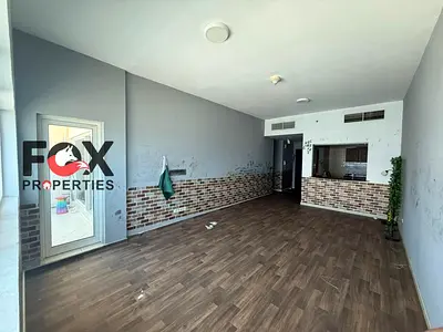 The largest two-bedroom apartment with a living room for annual rent in Ajman One Towers in the Al Rashidiya 3 area. Laundry room, storage room