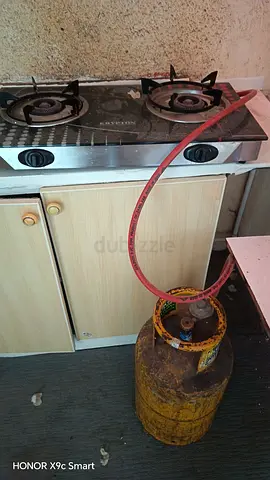 Cylinder with regulator and stove