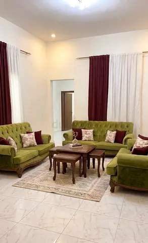 Urgent sale ! Green velvet living room sofa set  , matching cushions , curtains and red chairs