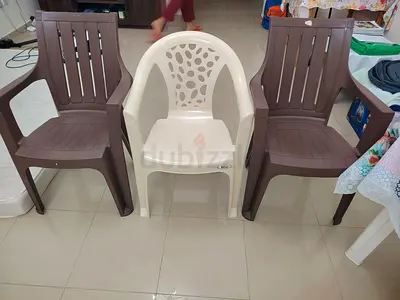Set of 3 Plastic Armchairs and one Plastic Table