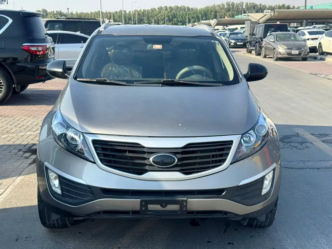 Kia Sportage 2013 — photo 1 of 9