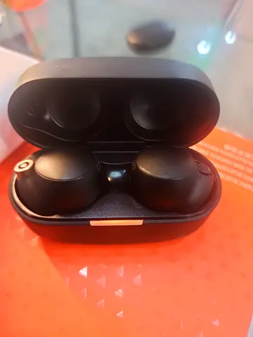 Used true wireless earbuds with charging case (good working condition)