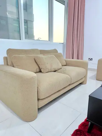Living set Two Beige Fabric Sofa with Cushions and an armchair - very Good Condition