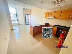 Studio flat with balcony and parking space available for annual rent in Al-Naimiyah Tower c