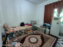Private Regular Bedroom with balcony available for executive bachelors