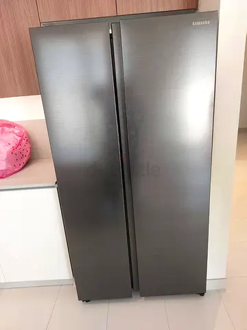 Samsung side by side refrigerators like new condition