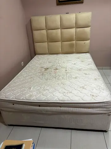 Queen size bed with spring mattress