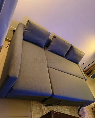 Ikea L Shape Sofa cum bed with big storage in L