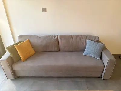 3-Seater Beige Fabric Sofa-Bed with Cushions - Good Condition