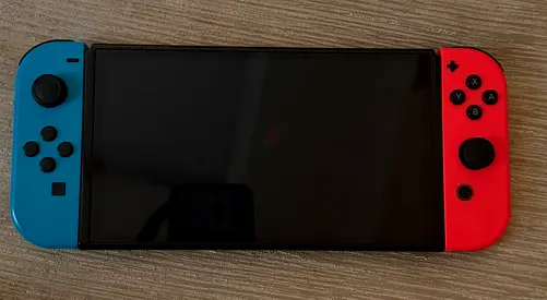 Nintendo Switch OLED (Neon Joy‑Con) - Good Condition, Almost new, Ready to Use
