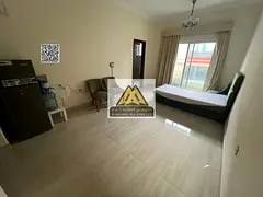 A spacious and elegantly furnished studio apartment with an open view and free internet access, offe