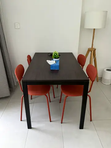 Dark Wood Dining Table with 4 Rust-Colored Chairs - Good Condition