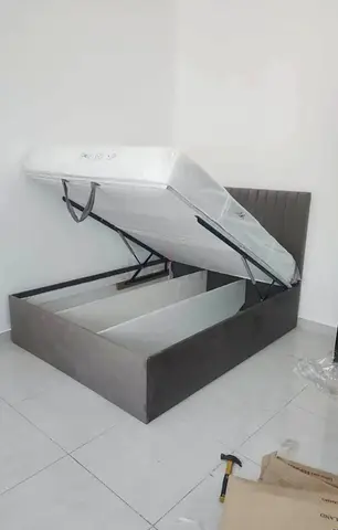 Queen storage bed with hydraulic lift - grey upholstered (brand new)