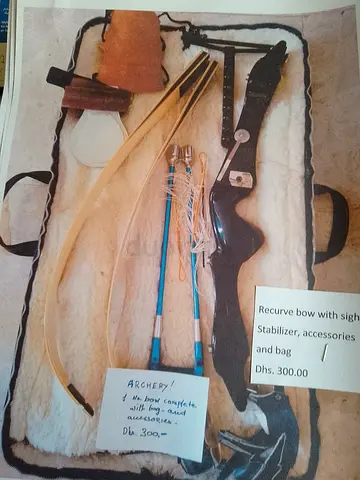 Recurve bow set with arrows, sight and carrying case - used