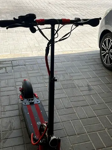 Used Electric Scooter with Foldable Handlebar - Good Condition