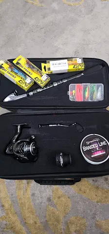 Compact fishing rod and reel kit with tackle box
