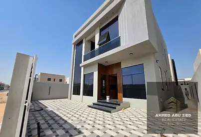Villa with 4 master bedrooms, large living room, men's majlis, spacious and equipped kitchen, 6 bathrooms, maid's room, built-in wardrobes, central ai