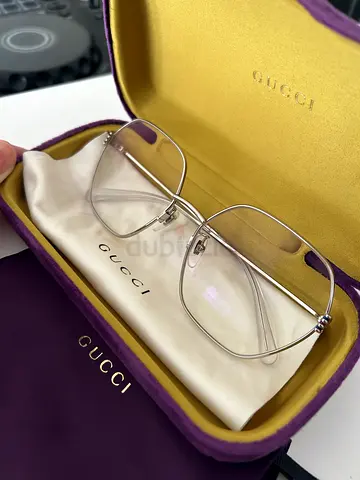 Gucci rimless silver eyeglass frames with case and pouch