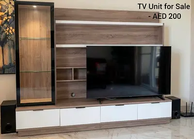 Modern wooden TV unit with glass display cabinet - AED 200
